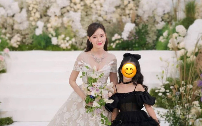 Midu khoe 'thiên thần nhỏ' trong lễ cưới, danh tính gây chú ý Ảnh 2