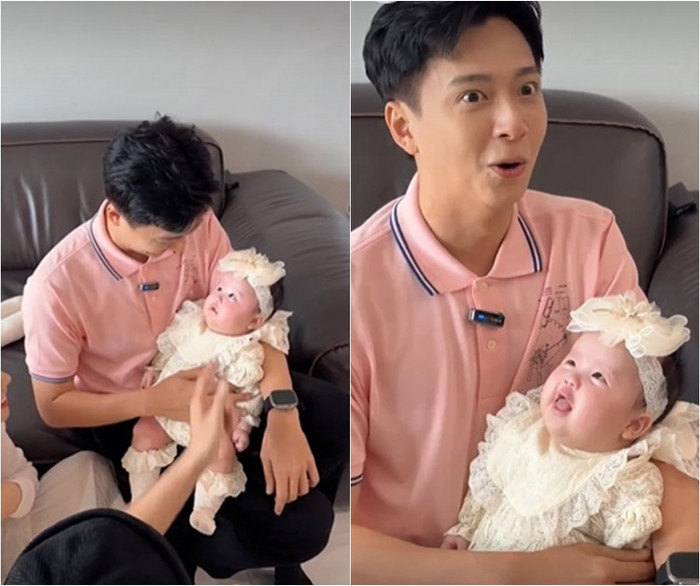 Con gái của Sam tỏ ra hợp tác khi được Ngô Kiến Huy ẵm trên tay, còn nhoẻn miệng cười xinh xắn. 