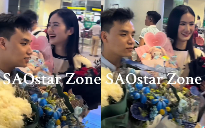 Bạn trai Hoa hậu Ý Nhi ghi điểm vì sự tinh tế khi hỗ trợ bạn gái cầm hoa. 