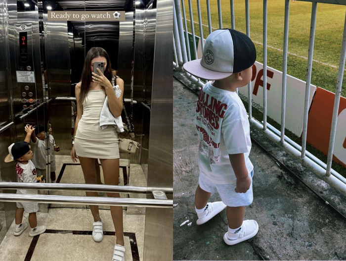 Vợ Bùi Tiến Dũng đưa con trai đến sân cỏ cổ vũ chồng. Ảnh chụp màn hình IGNV