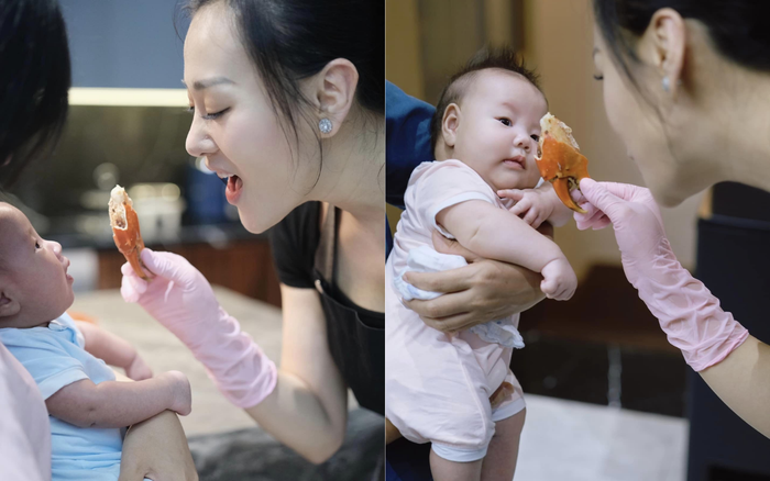 Phương Oanh lộ rõ niềm vui, sự hạnh phúc khi quan tâm đến cặp song sinh trong quá trình nấu ăn. Ảnh: FBNV