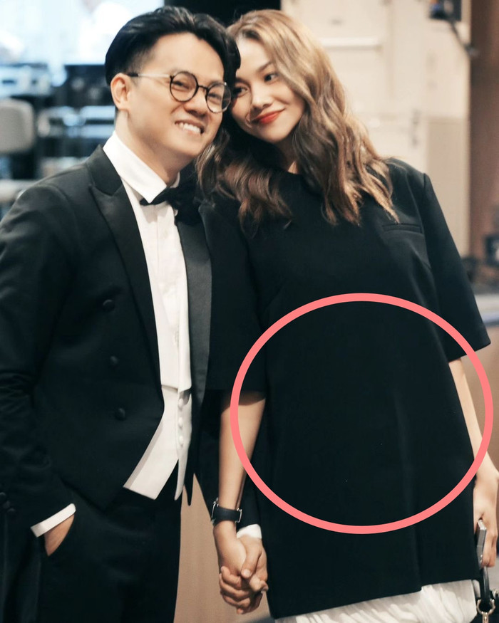 Thanh Hằng mặc váy thùng thình, bị nghi đang có 'tin vui'.