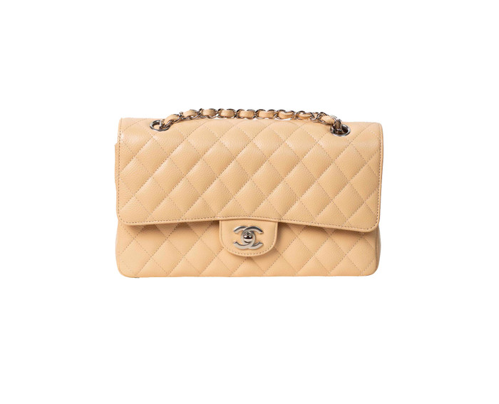 Midu mang mẫu túi xách đi kèm trị giá hơn 150 triệu đồng.