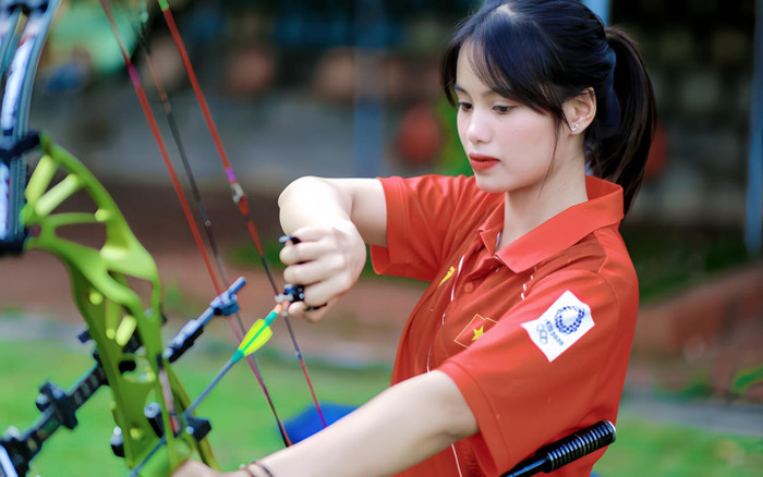 Nhan sắc xinh đẹp của nữ VĐV đầu tiên thi đấu cho thể thao Việt Nam tại Olympic 2024 Ảnh 2