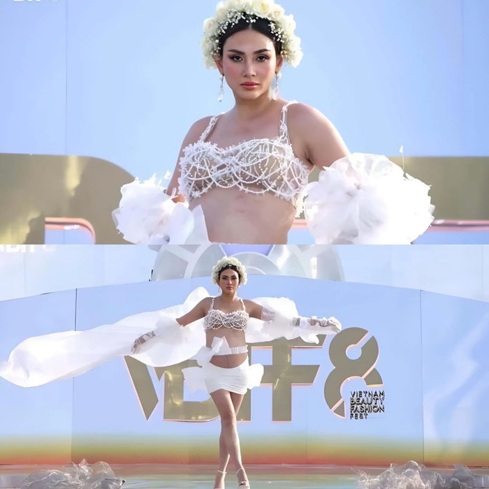 Võ Hoàng Yến catwalk sập sàn dù đang bầu 8 tháng. Ảnh chụp màn hình