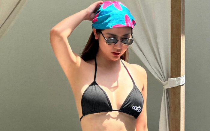 Huyền Lizzie diện bikini nhỏ xíu khoe vẻ đẹp căng tràn ở tuổi 34 Ảnh 2