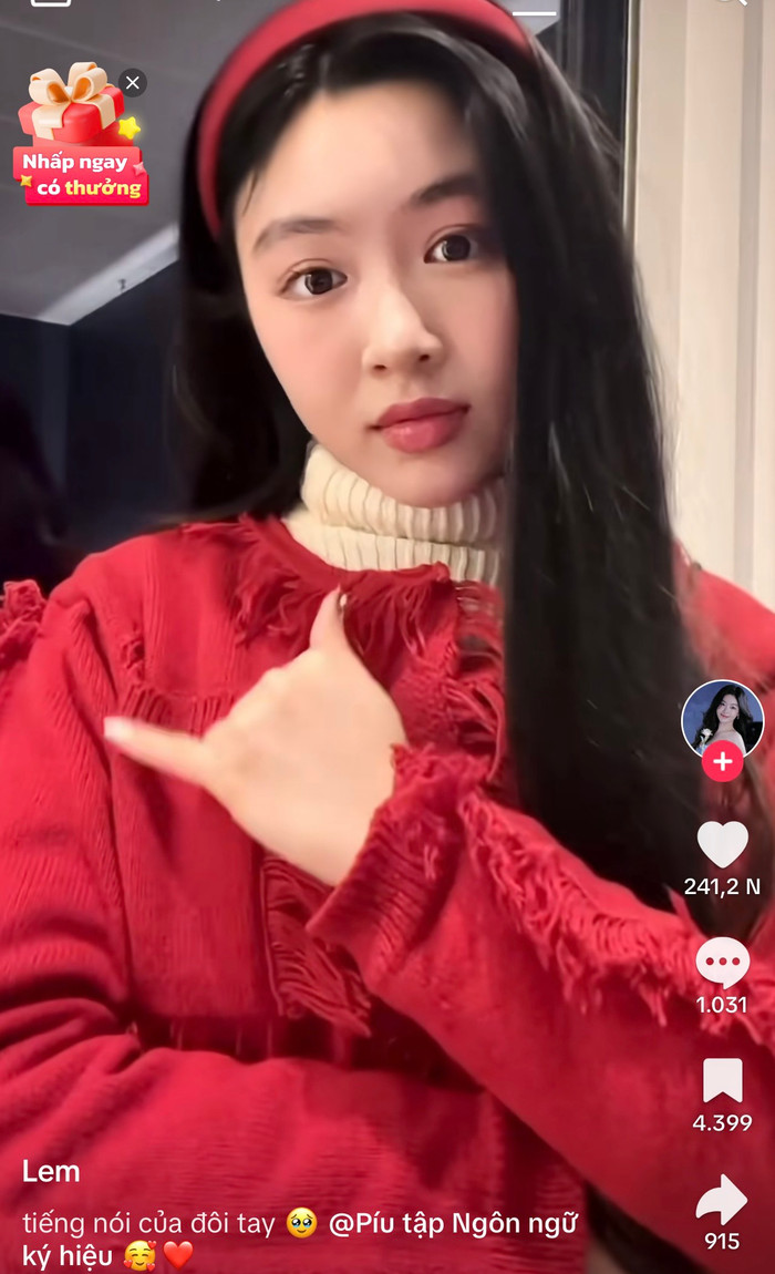 Lọ Lem thể hiện ngôn ngữ kí hiệu qua đôi tay.