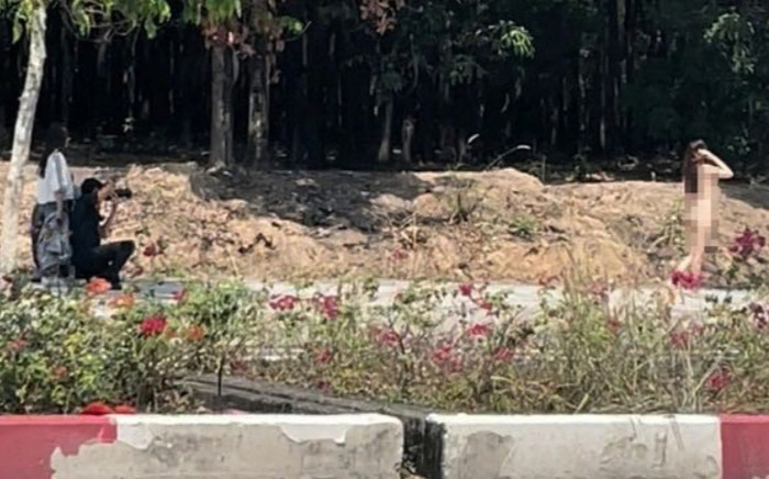 Công an tỉnh Bình Dương thông tin vụ cô gái chụp hình khoả thân trên đường Ảnh 2