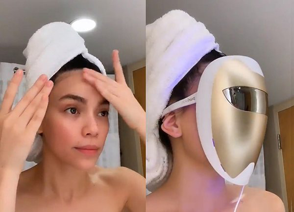 Hồ Ngọc Hà sử dụng mặt nạ LED trong quy trình dưỡng da. 