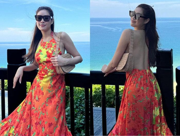 Hoa hậu Khánh Vân đầy sặc sỡ trong chiếc đầm hoa đỏ. Đương nhiên kiểu diện đồ không nội y đã làm gia tăng thêm vẻ đẹp quyến rũ của Hoa hậu Hoàn vũ Việt Nam 2019.