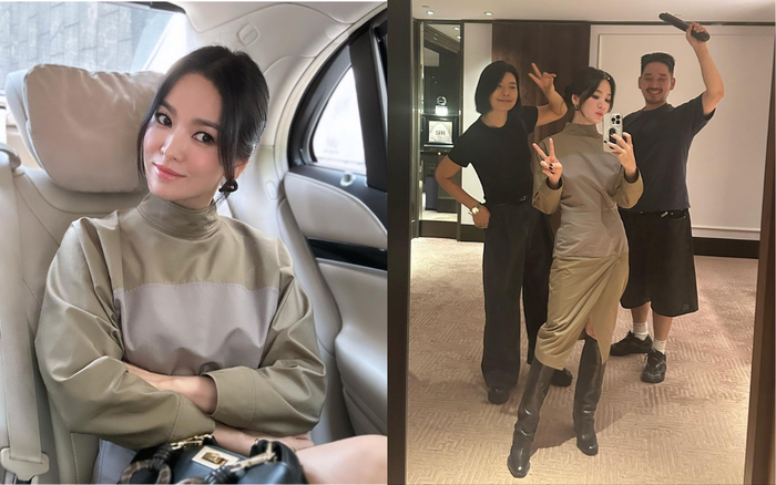 Song Hye Kyo mặc váy màu xanh rêu, che hết vóc dáng nhưng vẫn lộ rõ tâm trạng vui vẻ. Ảnh: Instagram kyo1122