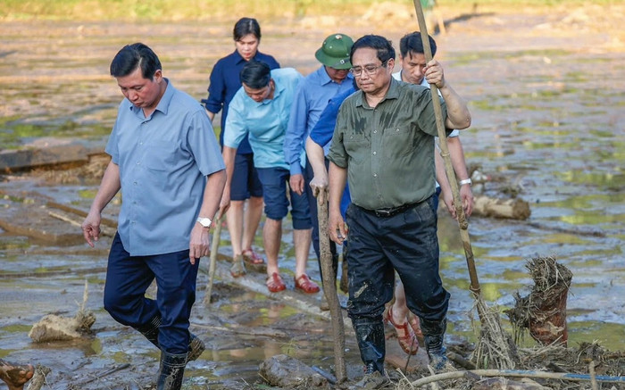 Phút giây nghẹn ngào của Thủ tướng Phạm Minh Chính tại Làng Nủ Ảnh 2