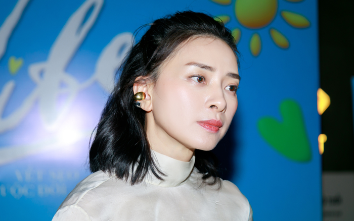 Nữ diễn viên Việt bán mì bất ngờ tái xuất Vbiz, nhan sắc U50 bên chồng kém 11 tuổi gây ngỡ ngàng Ảnh 1