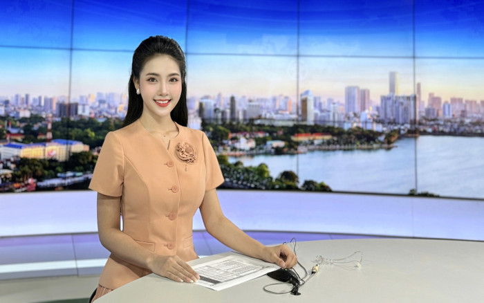 Nhan sắc xinh đẹp của nữ MC dự báo thời tiết gây 'bão mạng' Ảnh 2