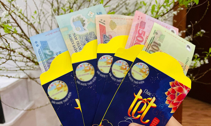 Nét đẹp văn hoá trong phong tục lì xì đầu năm mới của người Việt Ảnh 1