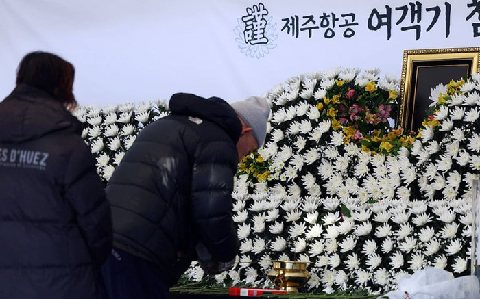 Gia đình nạn nhân vụ rơi máy bay Jeju Air không yêu cầu gia hạn thời gian quốc tang Ảnh 2