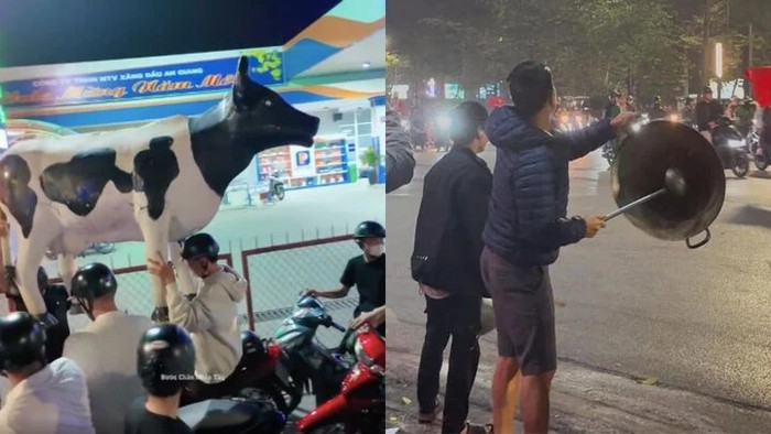 Chú bò ven đường, chiếc chảo của quán phở, mọi thứ đều có thể trở thành 'đạo cụ đi bão' đầy sáng tạo của người hâm mộ bóng đá Việt Nam. Ảnh: VTC News