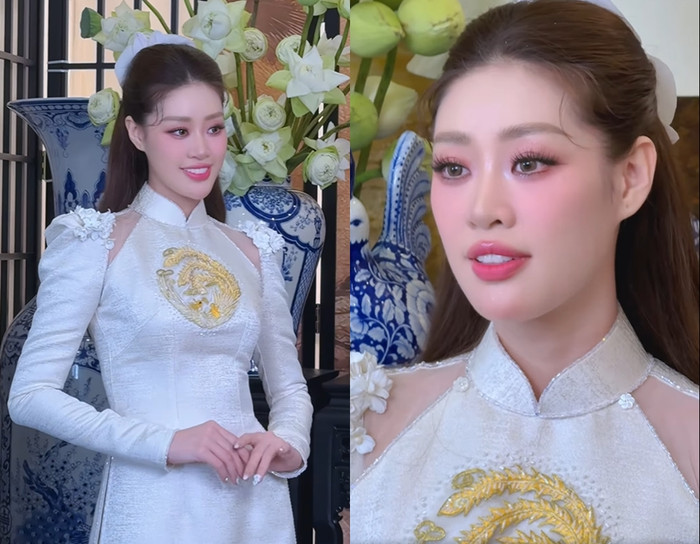 Hoa hậu Khánh Vân cũng từng chọn áo dài trắng thêu họa tiết rồng phượng trong ngày vui. (Ảnh FBNV)