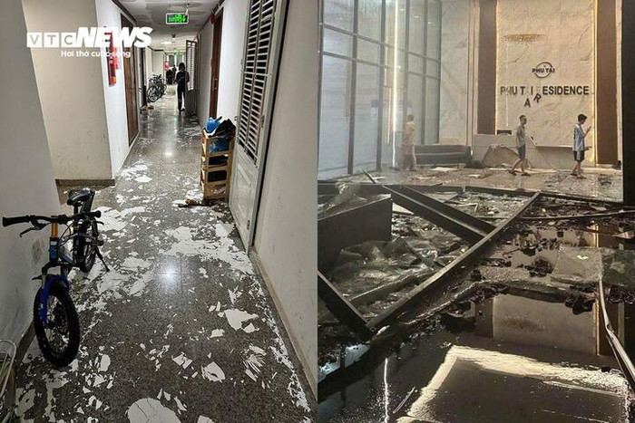 Chung cư bị gió bão làm hư hỏng nặng nề. Ảnh: VTC News