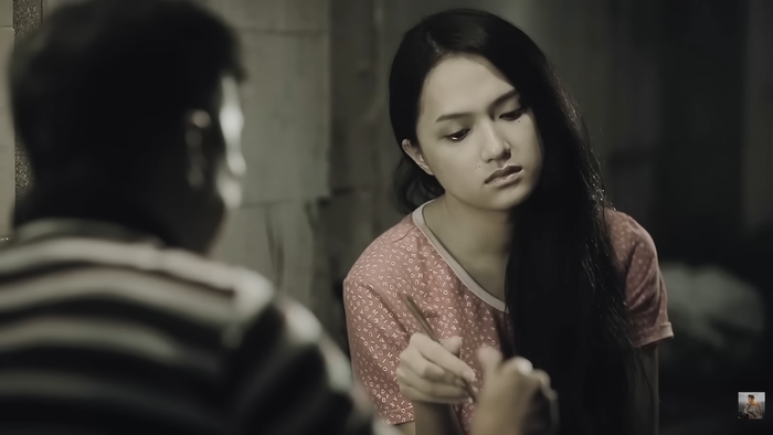 Hình ảnh Hương Giang trong MV của Đàm Vĩnh Hưng 10 năm trước. 