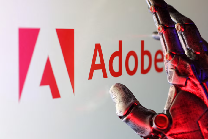 Adobe cho biết họ đang tích hợp các ứng dụng Photoshop, Adobe Express và Acrobat vào ChatGPT.   Ảnh: Reuters