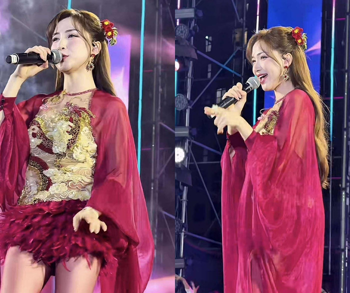 Hòa Minzy diện váy ngắn khoe chân thon trong lần biểu diễn mới đây. (Ảnh chụp màn hình)