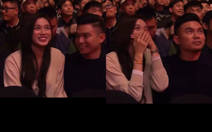 Đỗ Thị Hà hoang mang khi vô tình được 'lia cam' khoảnh khắc cùng chồng đi xem một giải đấu. Ảnh: VTV Cab