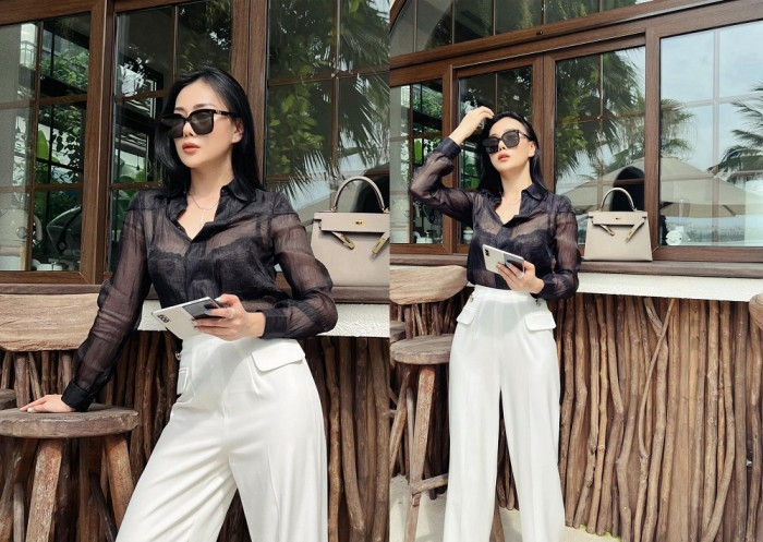 Chiếc điện thoại nổi bật trên tay của Phương Oanh. Ảnh: FBNV