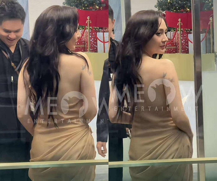 Nữ ca sĩ khoe lưng trần gợi cảm trong chiếc đầm có dáng cổ yếm. (Ảnh từ TikTok Meow Entertainment)