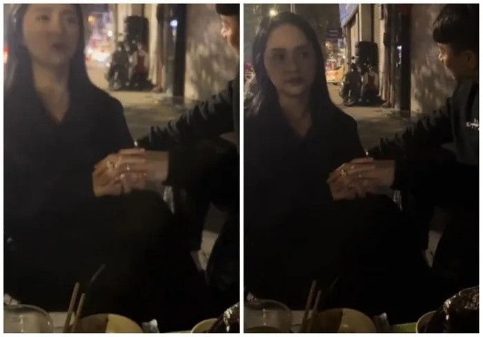 Cặp đôi Vbiz nắm chặt tay nhau, để lộ nhẫn đôi ở ngón áp út. (Ảnh FBNV)