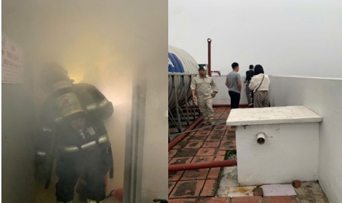 Lực lượng chức năng triển khai các mũi tiếp cận, hướng dẫn các nạn nhân thoát nạn xuống nơi an toàn. Ảnh: Công an TP Hà Nội