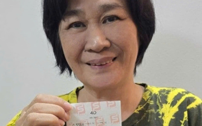 Đi xem múa lân, người phụ nữ bất ngờ nhặt được vé số trúng độc đắc Ảnh 2