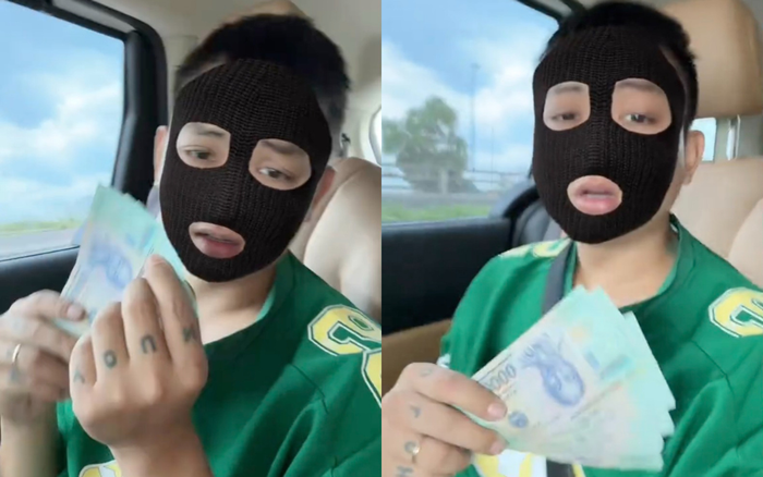 Hoài Lâm tự tin khoe cầm một cọc tiền có giá trị lớn trong video mới nhất. Ảnh: TikTok yuntulo