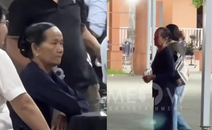 Mẹ Quý Bình thẫn thờ, đượm buồn trong tang lễ của con trai. (Ảnh: Chụp màn hình Meow Entertainment) 