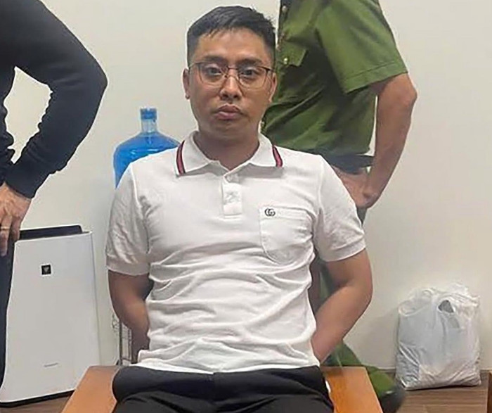 Bùi Đình Khánh tại cơ quan công an