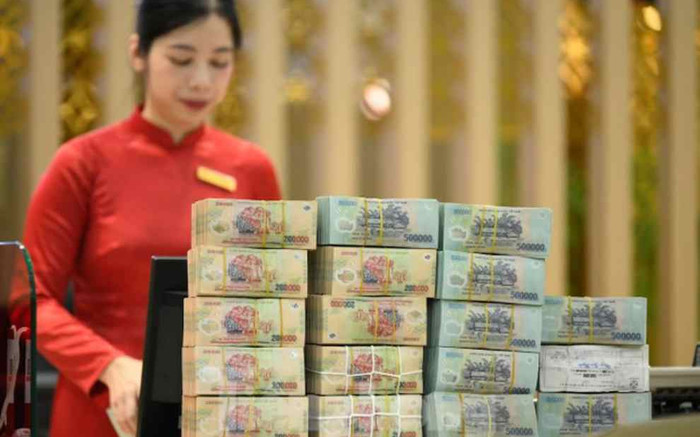 Lãi suất ngân hàng sẽ điều chỉnh thế nào trước áp lực thuế quan của Mỹ? Ảnh 2