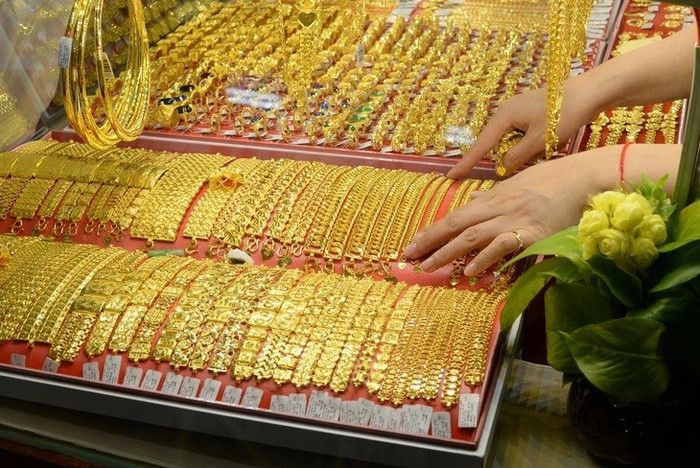 Giá vàng giảm mạnh, người mua lỗ hơn 5 triệu đồng/lượng sau 6 ngày Ảnh 1