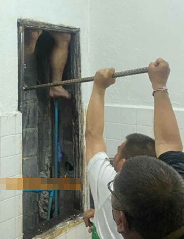 Tên trộm bị mắc kẹt sau khi chạy trốn, phải nhờ cảnh sát đến giải cứu Ảnh 2