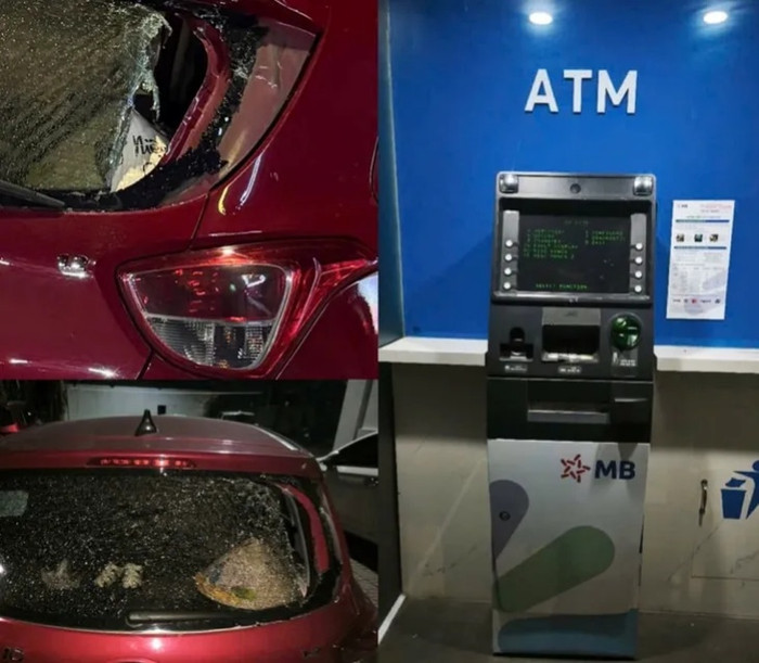 Xe ô tô và trụ ATM bị hư hỏng sau màn đập phá của Ngân Baby. Ảnh: VTV