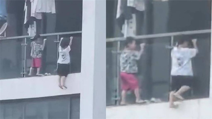 Xôn xao hai đứa trẻ leo ra ngoài ban công tầng 13 chơi đùa như 'hít xà' Ảnh 2