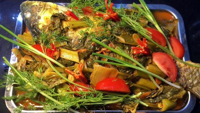 Món cá chép om dưa. (Ảnh minh họa từ Thanh Niên)
