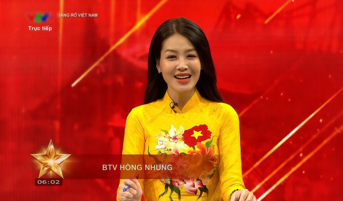 BTV Hồng Nhung dẫn truyền hình trực tiếp lễ diễu binh, diễu hành 2/9. (Ảnh chụp màn hình)