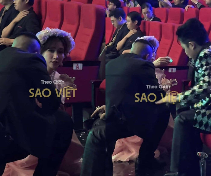 Khoảnh khắc Hòa Minzy cúi xuống nhặt chiếc cúp bị vỡ. (Ảnh chụp màn hình từ TikTok Theo chân sao Việt)