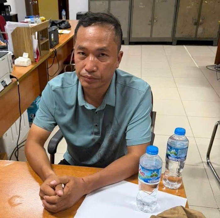 Trần Quý Hoan tại Cơ quan Công an. Ảnh: Công an TP Hà Nội