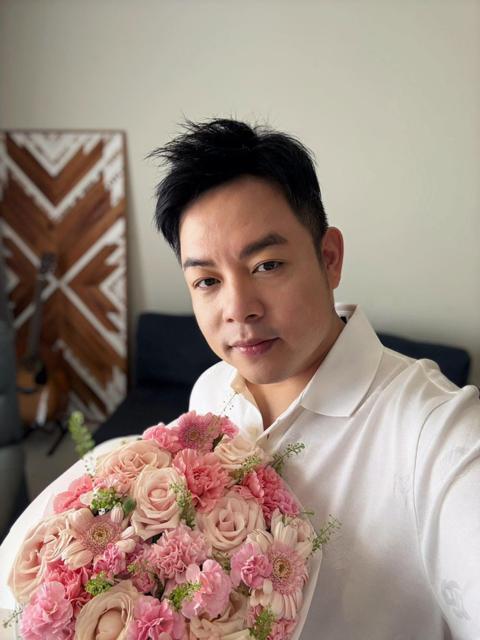 Quang Lê kín tiếng trong chuyện tình cảm.