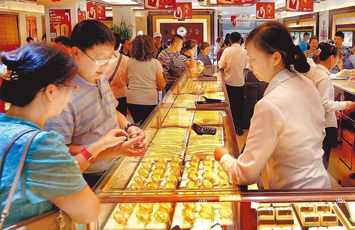 Người phụ nữ đem 8kg vàng đi bán, thu được số tiền khiến cả tiệm xôn xao Ảnh 3