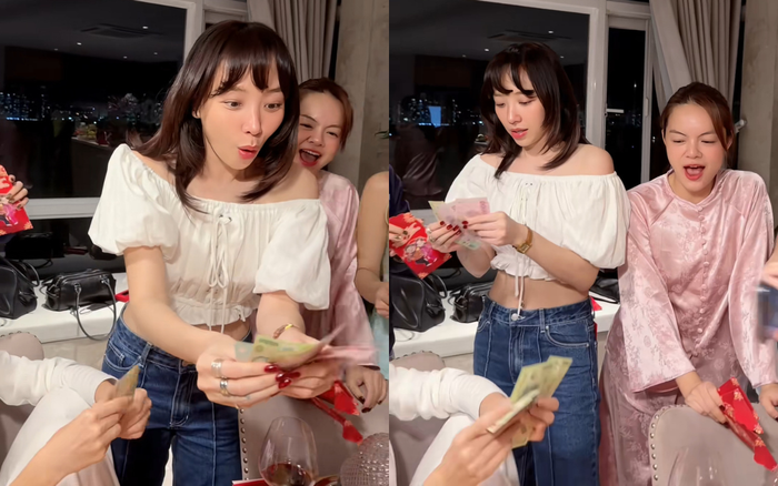 Tóc Tiên ngỡ ngàng khi nhận được phong bao lì xì chứa số tiền 9 trăm nghìn từ Phạm Quỳnh Anh. Ảnh chụp màn hình