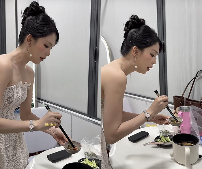 Ngọc Trinh say mê thưởng thức món tôm hùm đất theo vị của Trung. (Ảnh chụp màn hình từ TikTok @lifestyle)