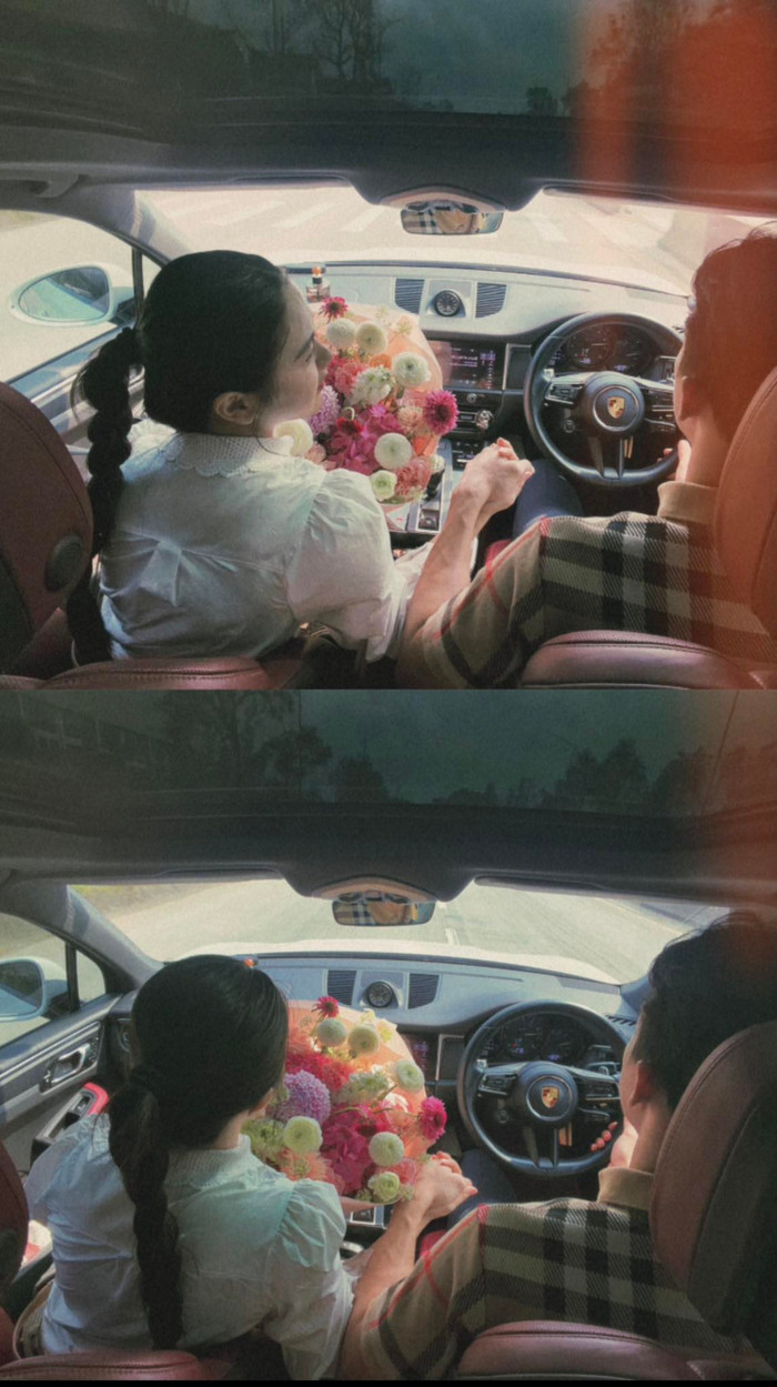 Trung vệ Quế Ngọc Hải tặng hoa cho vợ ngày 8/3 trên chiếc xe khoảng 3 tỷ đồng. (Ảnh: FBNV)