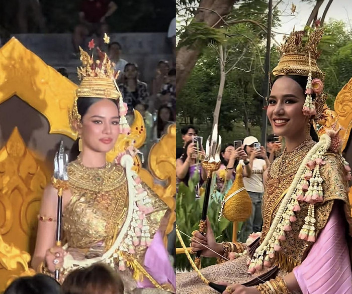 Opal Suchata xuất hiện lộng lẫy như nữ thần khi diễu hành trên đường phố, mở màn cho mùa lễ hội. Ảnh chụp màn hình từ TikTok Opal.for.you (FC).